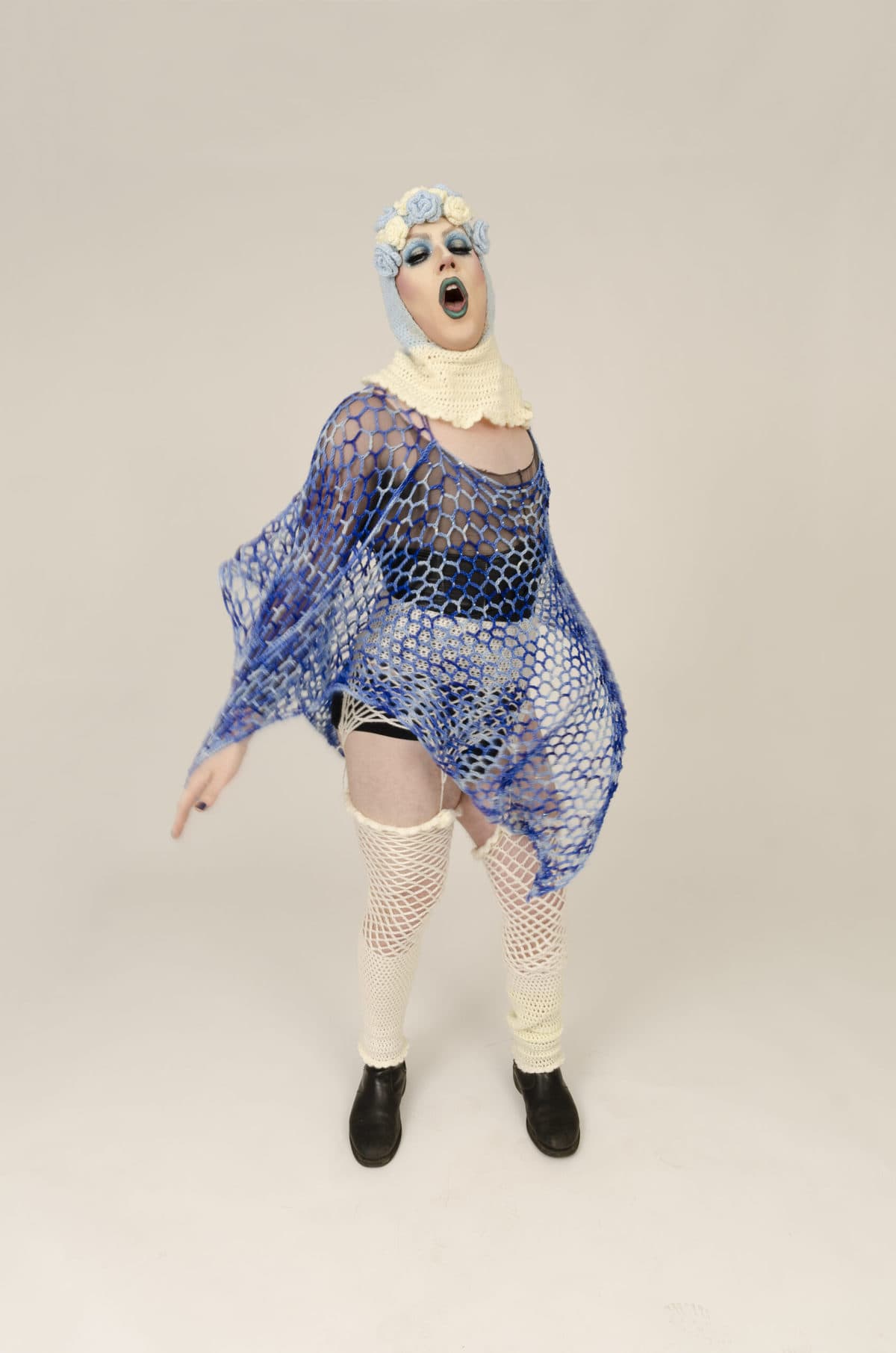 image description: a drag performer in a hand-made costume