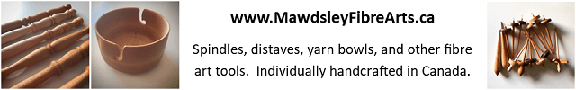 Ad description: Wooden yarn bowl, distaffs and spindles with the URL www.MawdsleyFibreArts.ca.