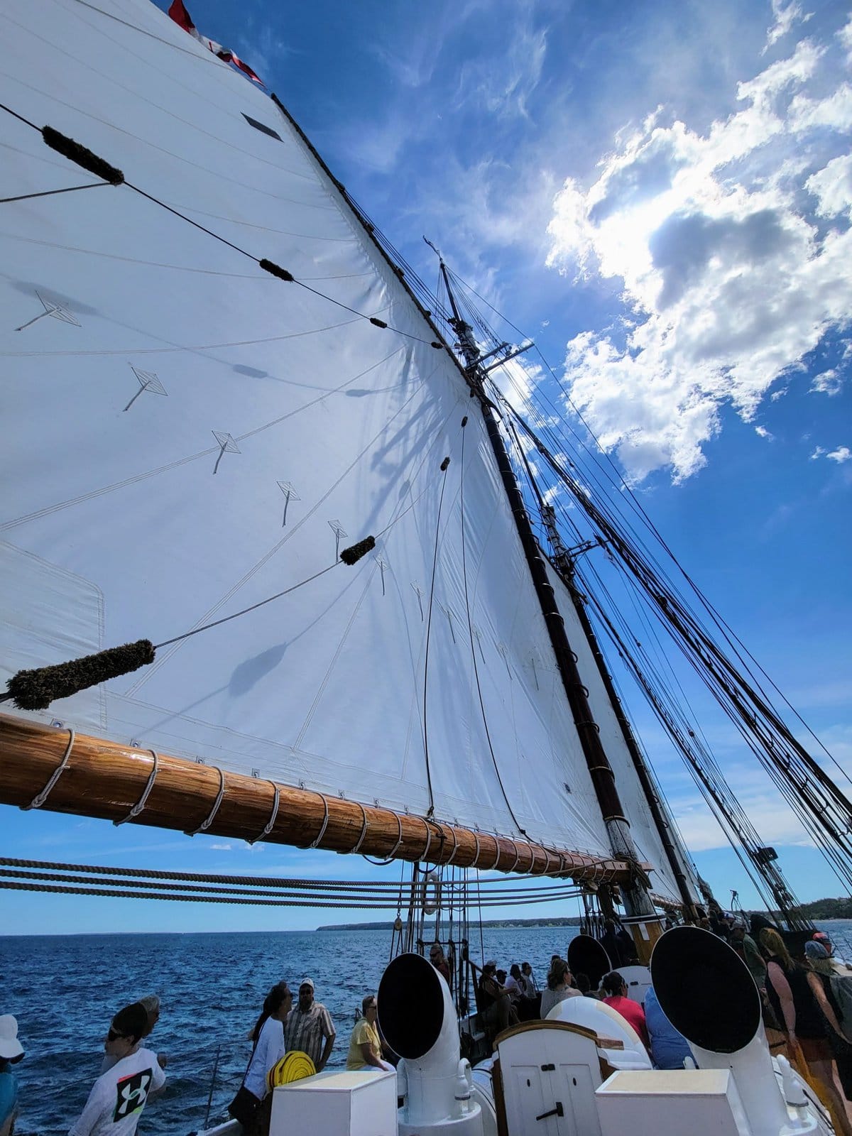 image description: the Bluenose sailing boat's sail, taken from the deck
